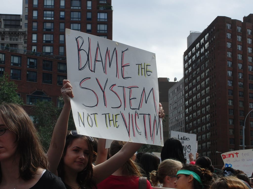 Blame the system not the victim