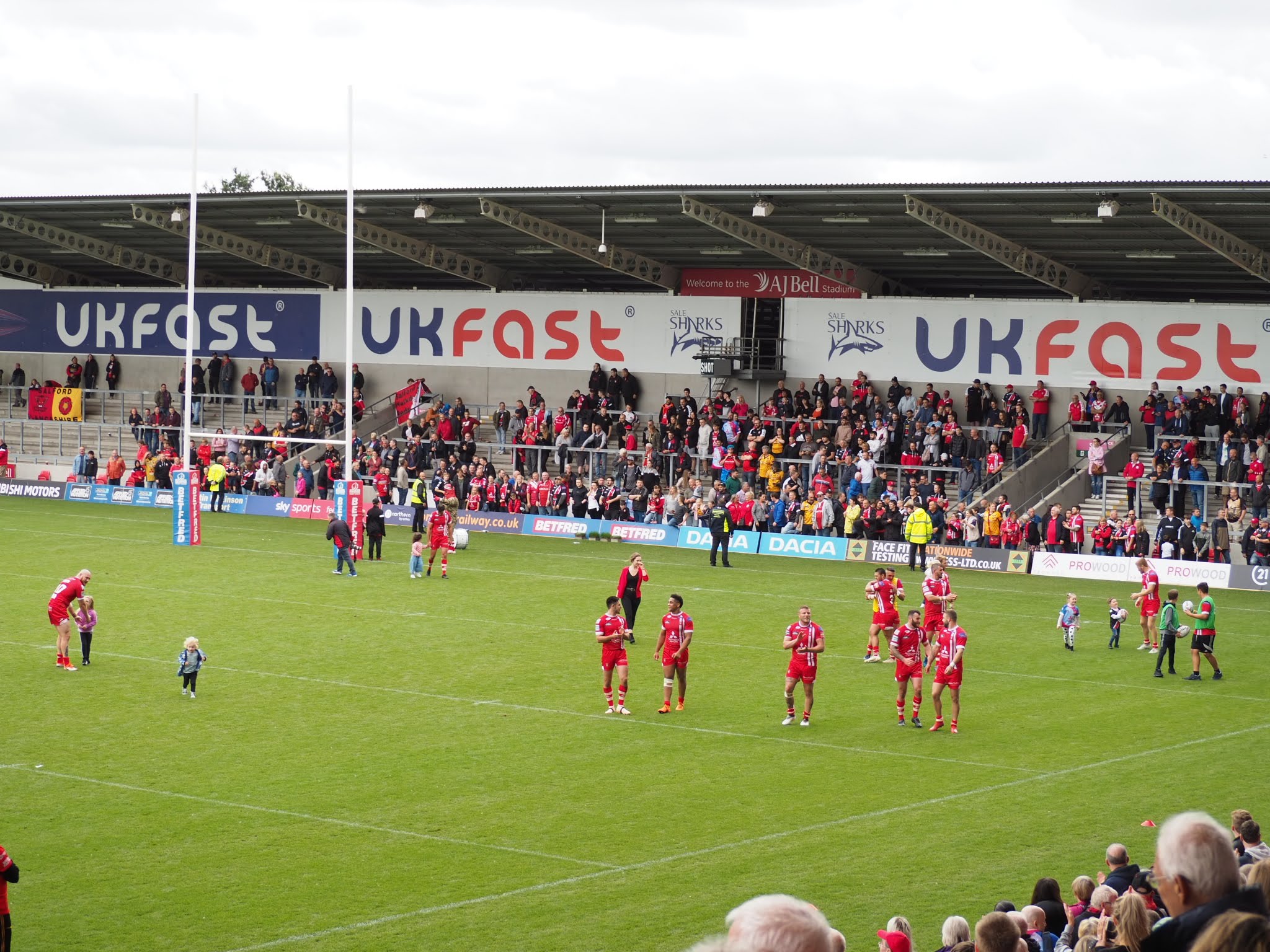 Salford Rugby League fans celebrate.