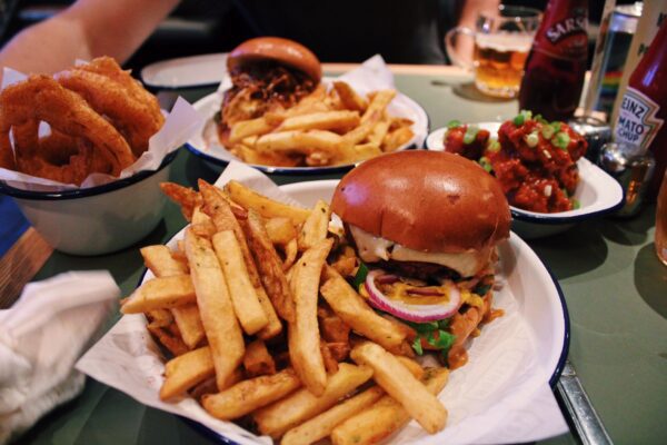'Good Karma' and 'Plant' Burger with Onion Rings at Honest Burgers Manchester