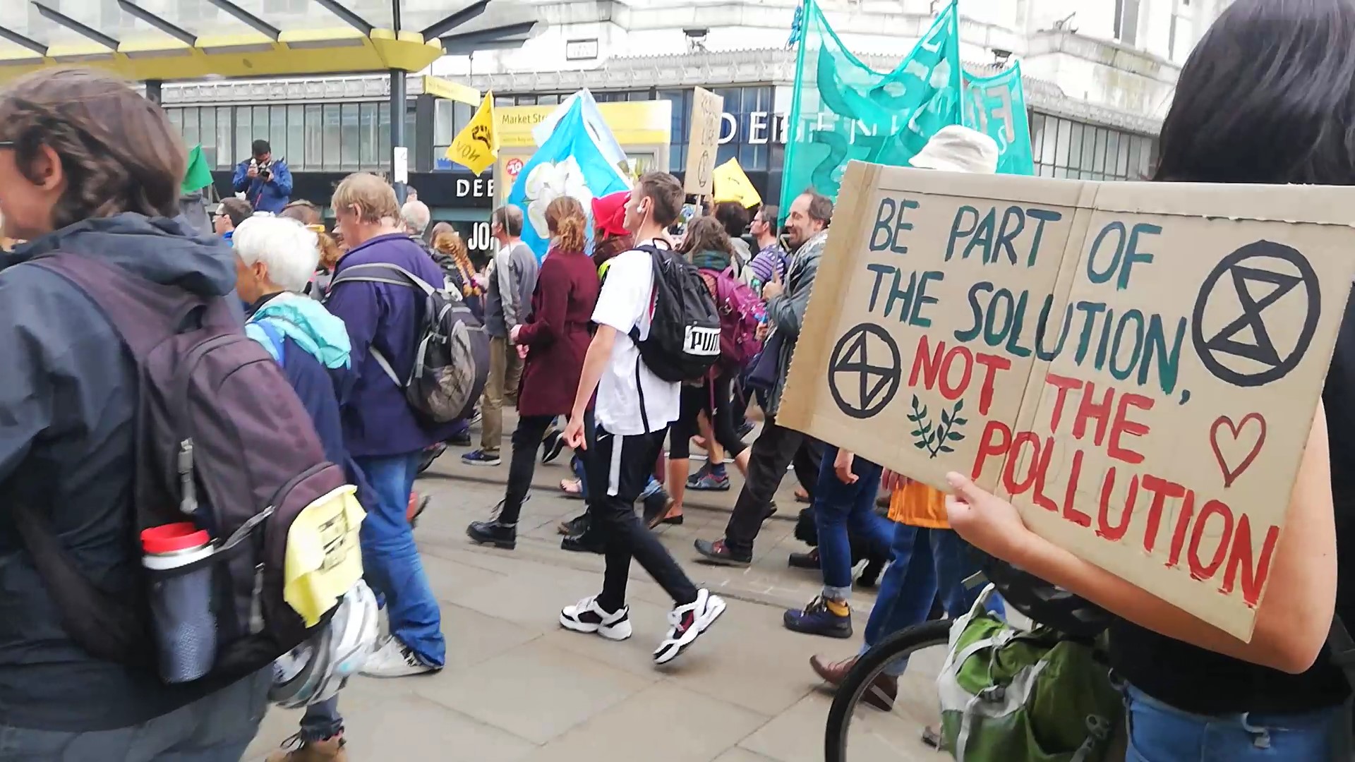 XR Protestor with a Banner