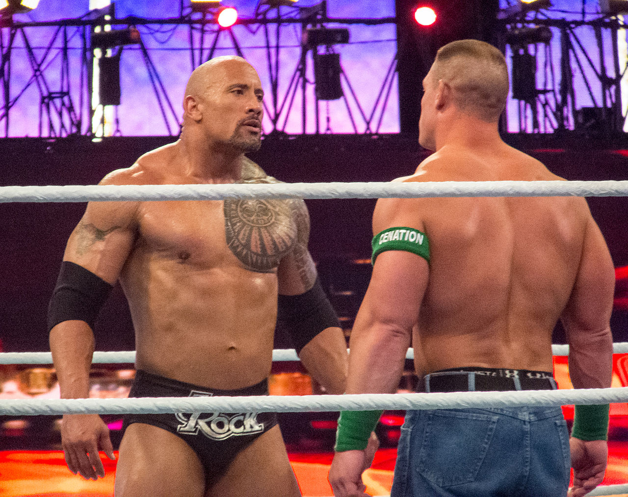 1280px-The_Rock_vs_John_Cena