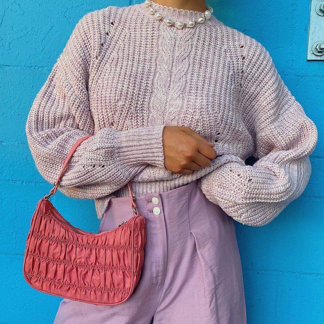 Lilac chunky jumper paired with structured lilac suit trousers