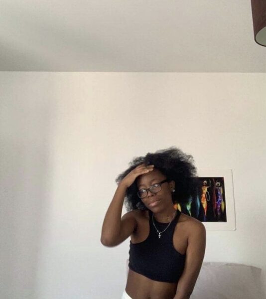 Ose showing off her curls 