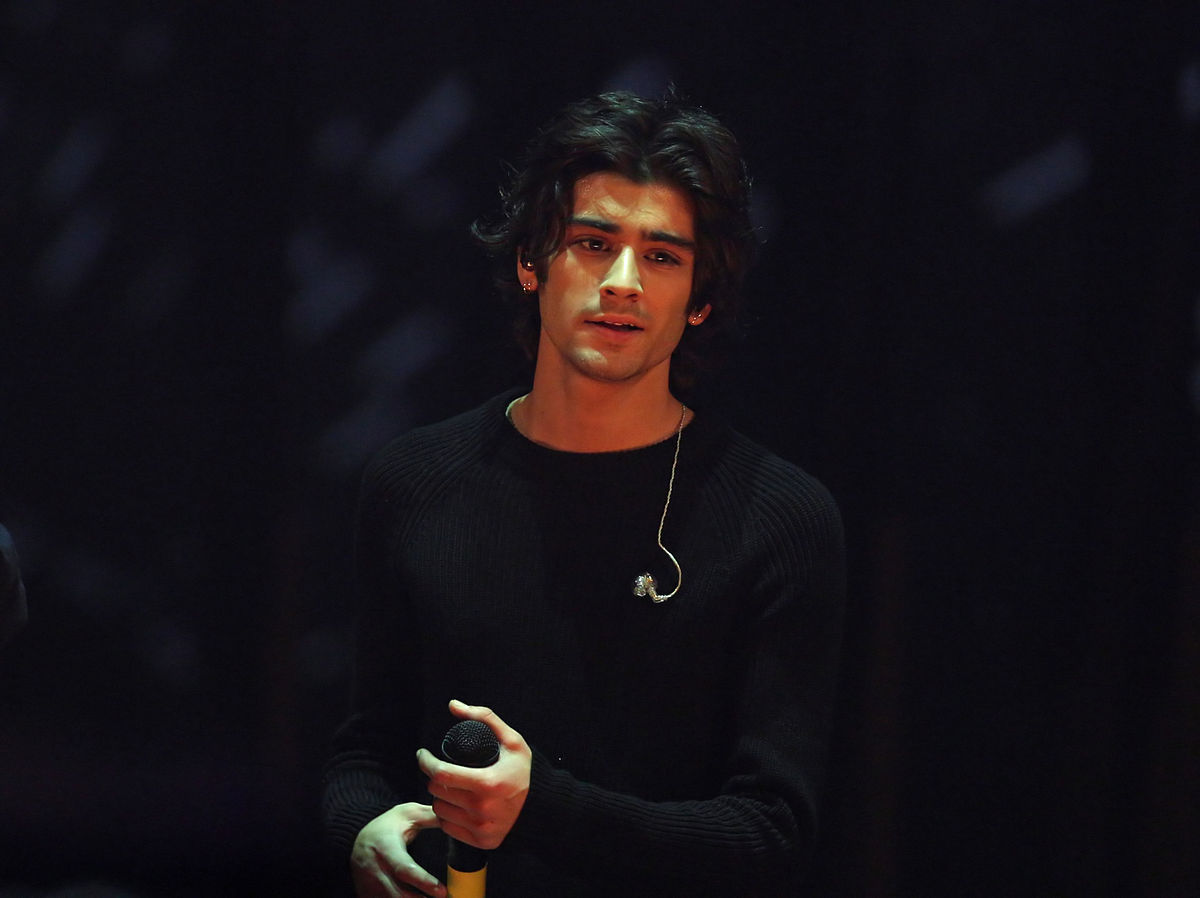 A black backdrop for performance by solo artist Zayn