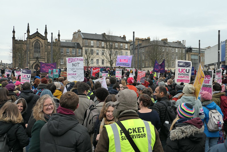 A crowd of UCU staff protesting