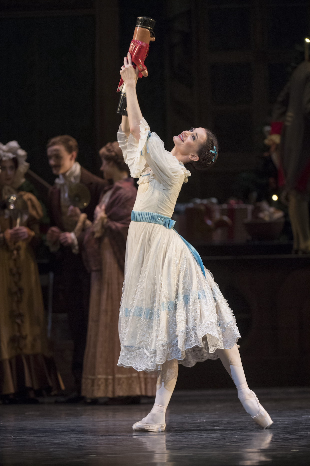 Anna Rose O’Sullivan as Clara in The Nutcracker, The Royal Ballet holding the Nutcracker Doll © 2018 ROH. Photograph by Alastair Muir