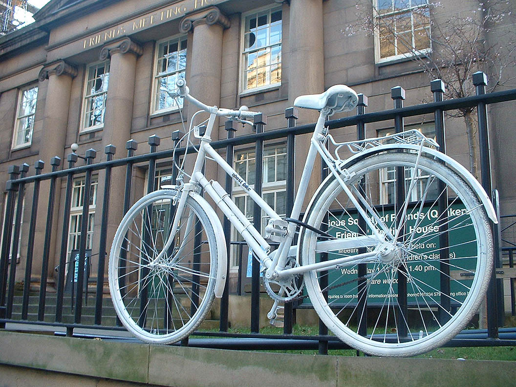 White bike locked up