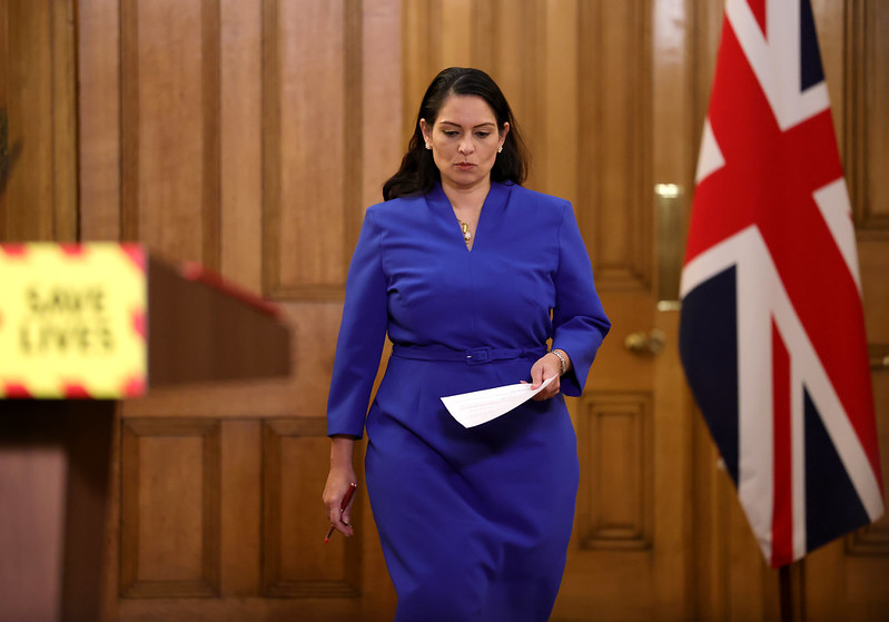 Priti Patel walking
