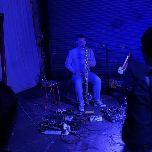 Ben Bertrand, with his bass clarinet and array of pedals at The White Hotel, 2nd June 2022