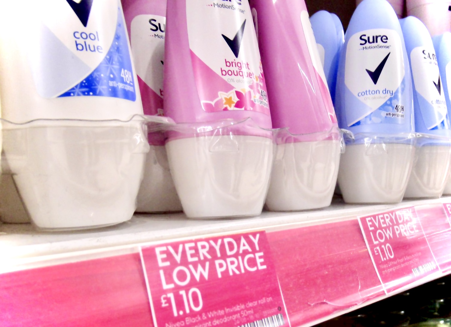 Image of deodorant lined up on a shelf, signbelow read'Every Day Low Price £1.10"