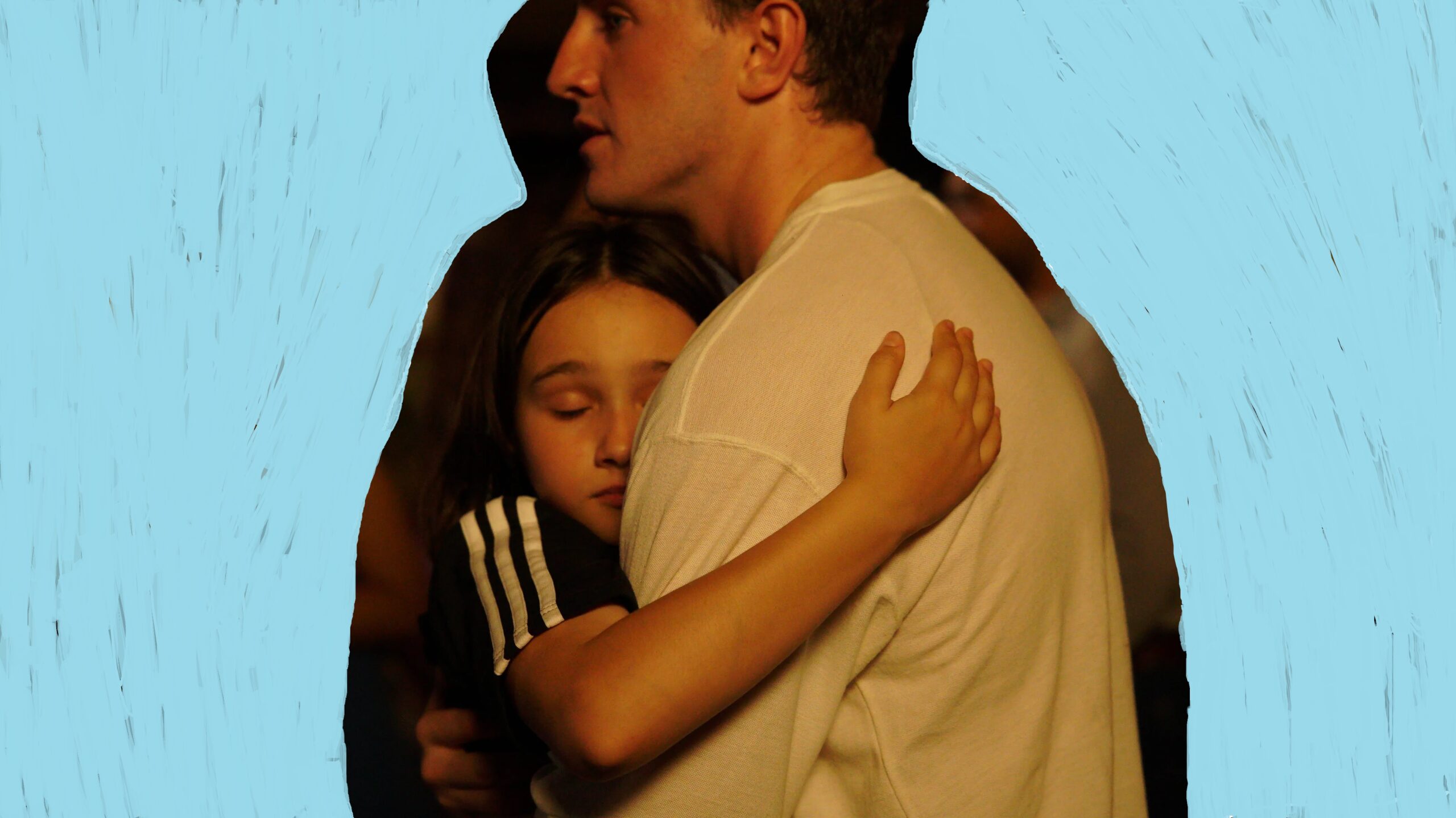photo of father and daughter hugging