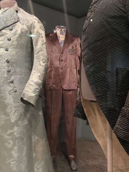 A satin red and white striped suit 
