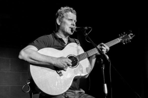 Nigel Clark playing guitar