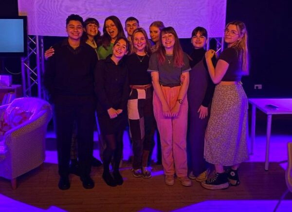 photo of cast and crew of capital letters