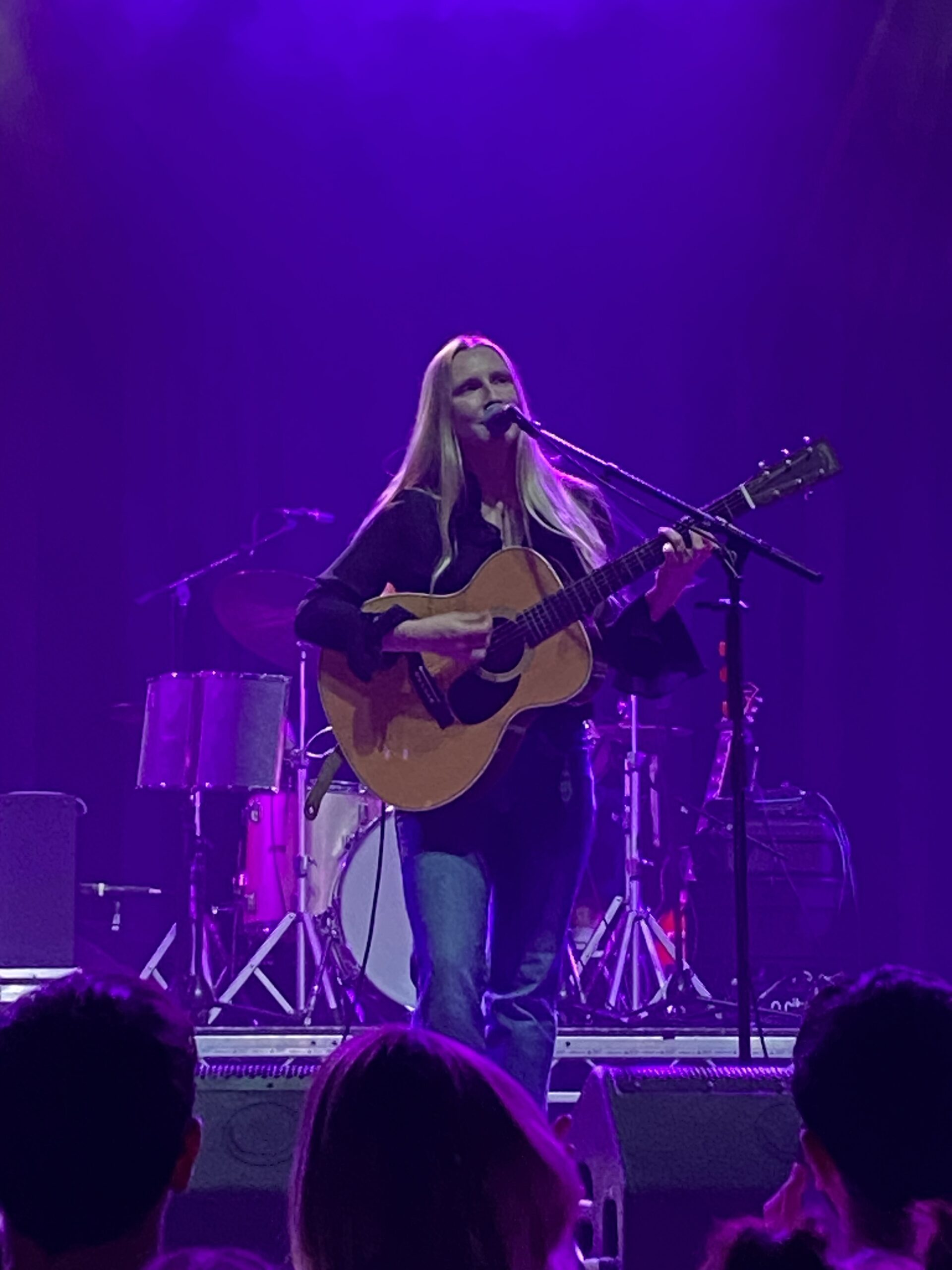 Image: Billie Marten onstage with a guitar