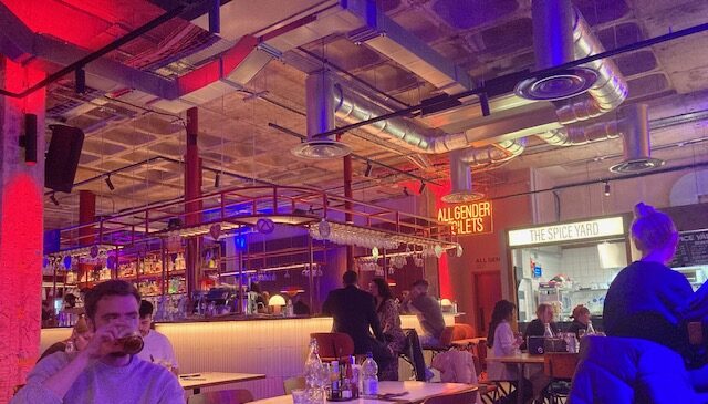 View of the bar and adjacent food stall