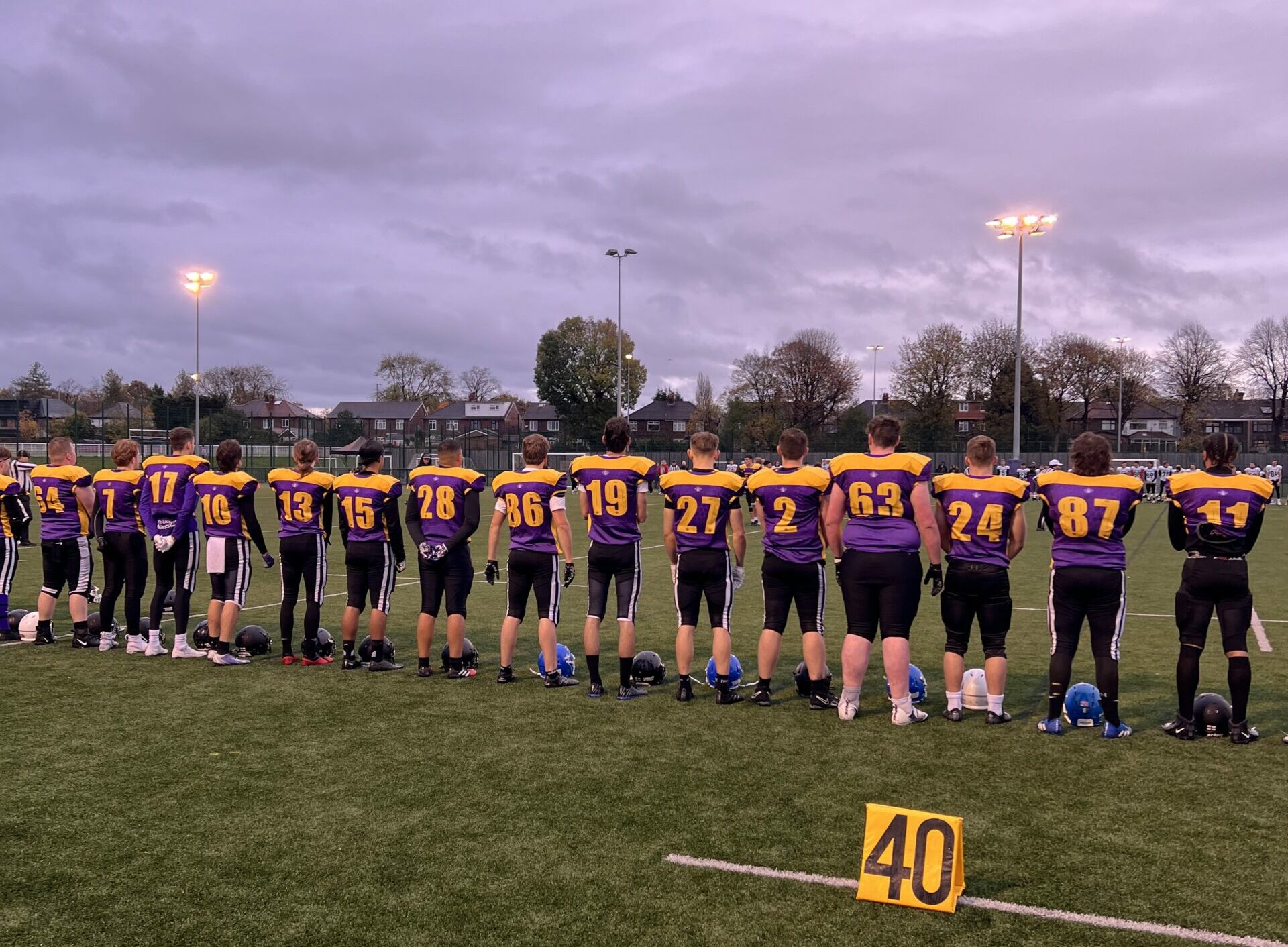 The Tyrants observing a minutes silence before the game.