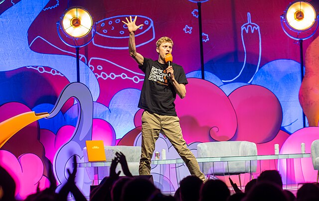 James Acaster performing on stage