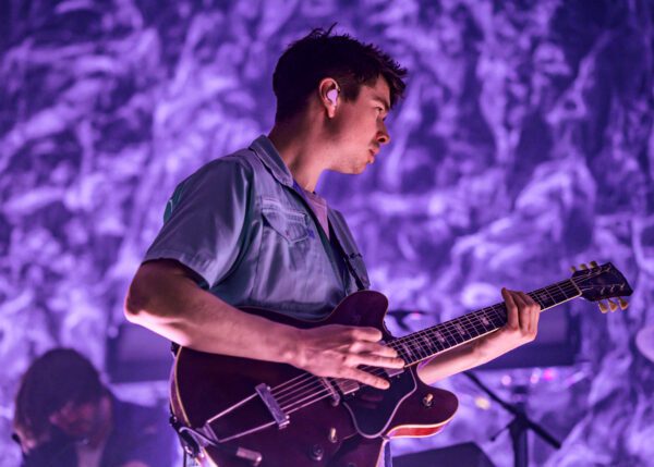 Alex Robertshaw performing with Everything Everything
