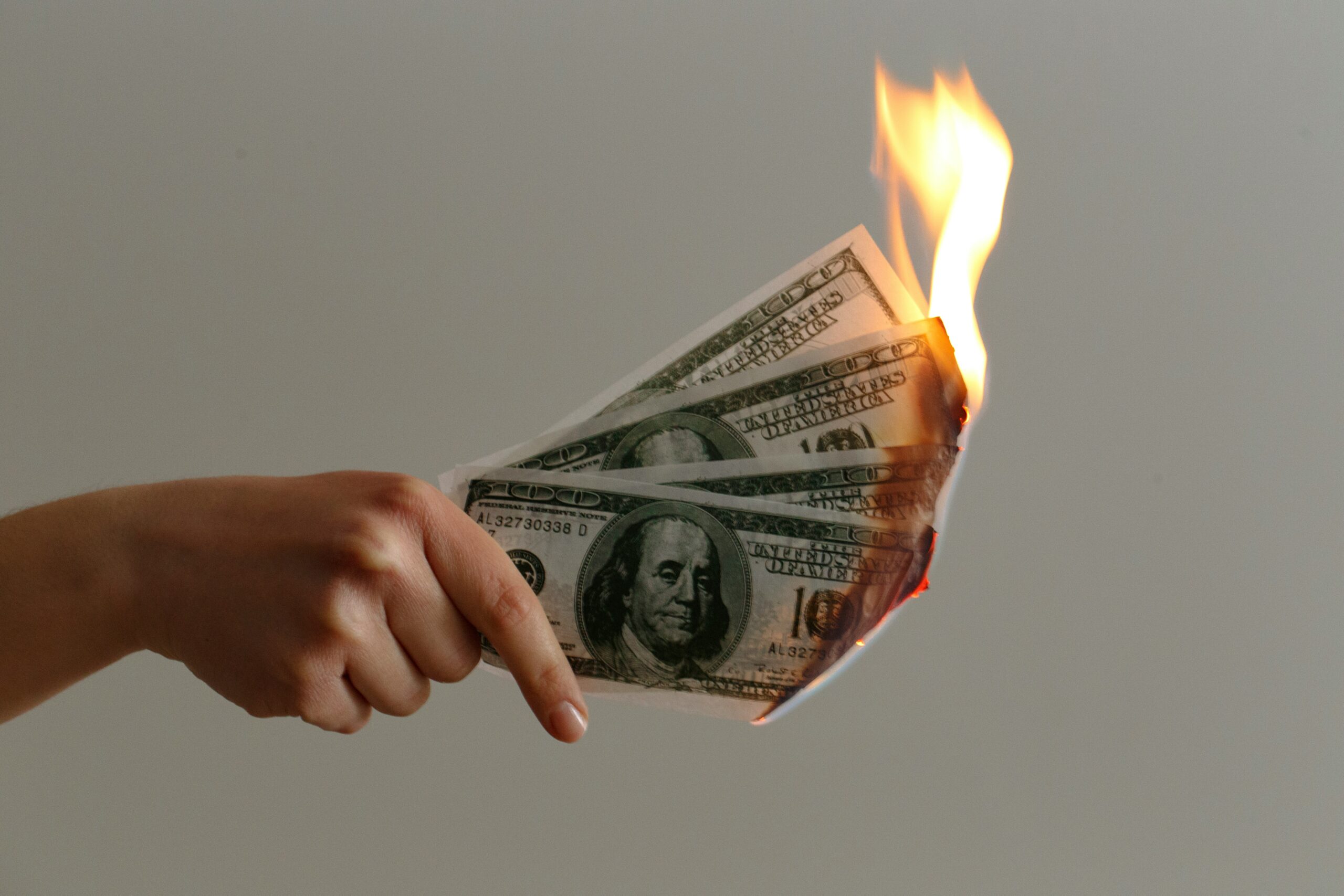 Dark Money in elections - American dollar burning.