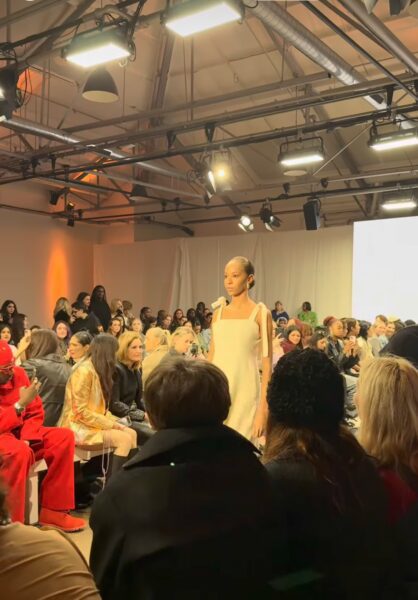 Model in white dress from Ahkeke Fashion Show 