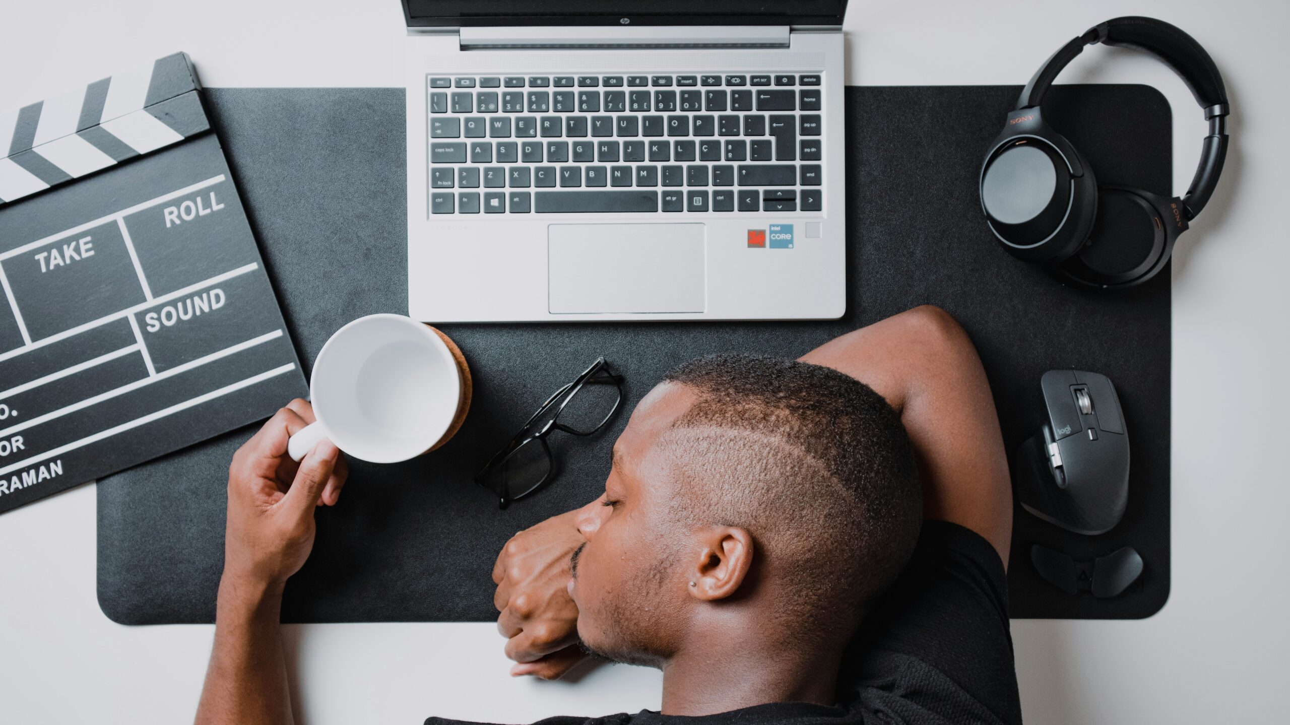 Man at Desk with Laptop