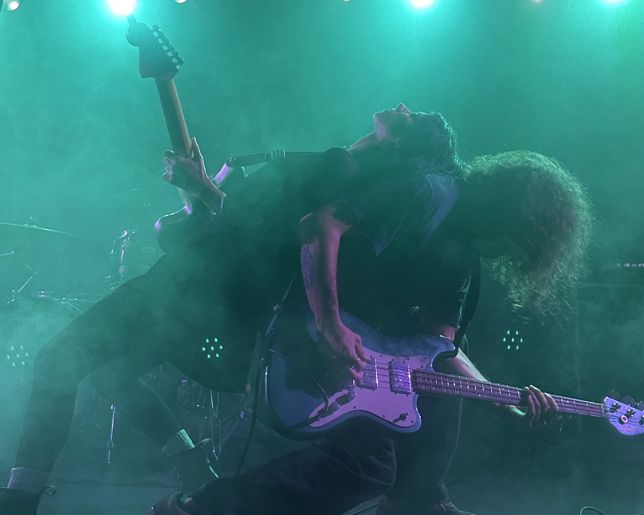 Softcult members playing the guitar