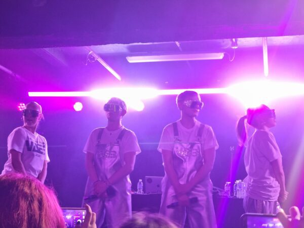VÆB and dancers posing