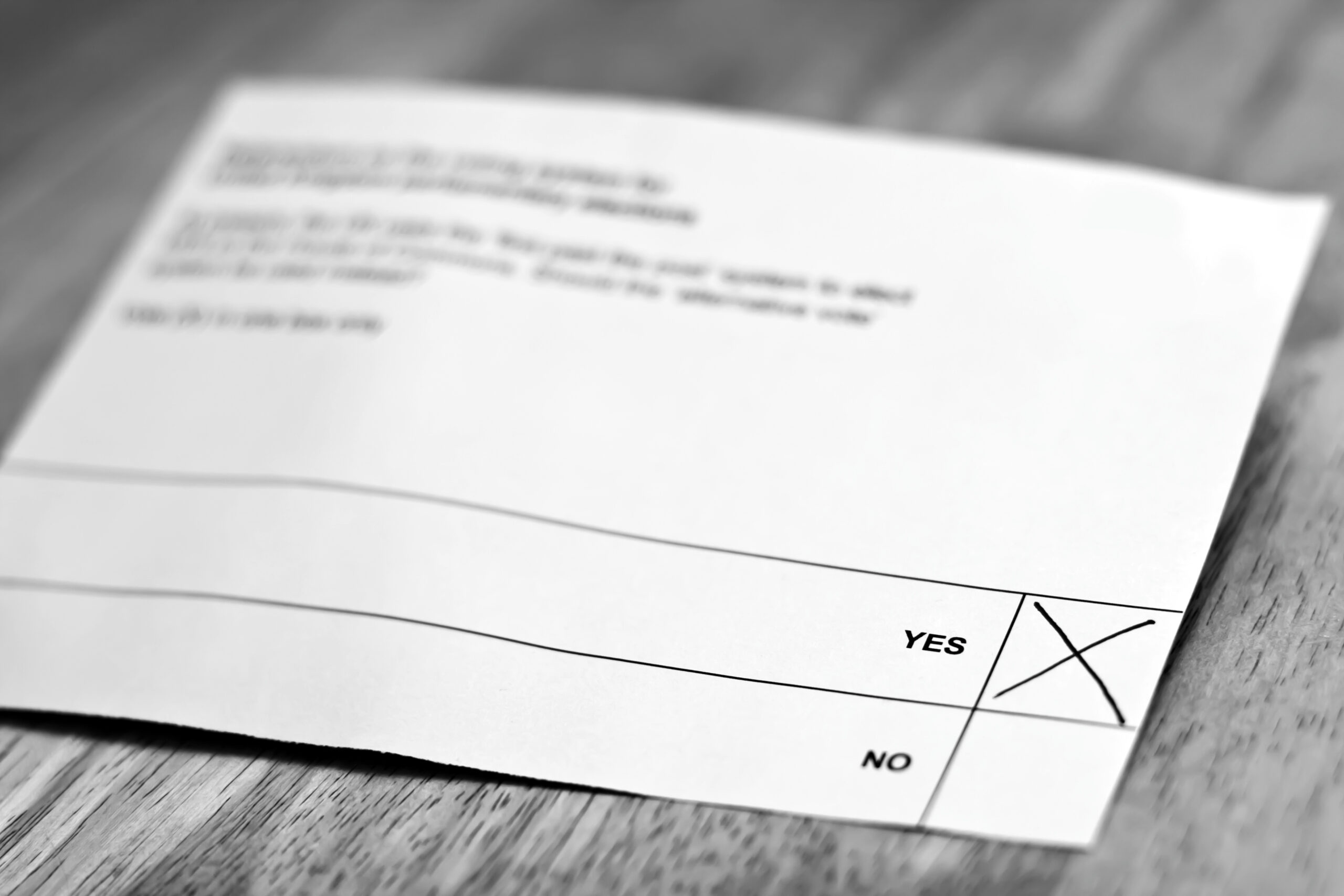 Voting ballot with yes or no options