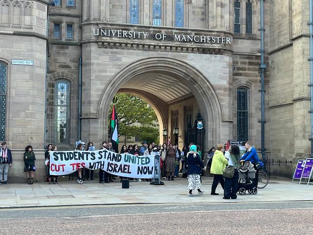 Students protest the UoM-TUA partnership outside the Whitworth building.